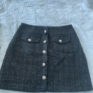 Woman’s tweed black mini skirt with buttons- size 0